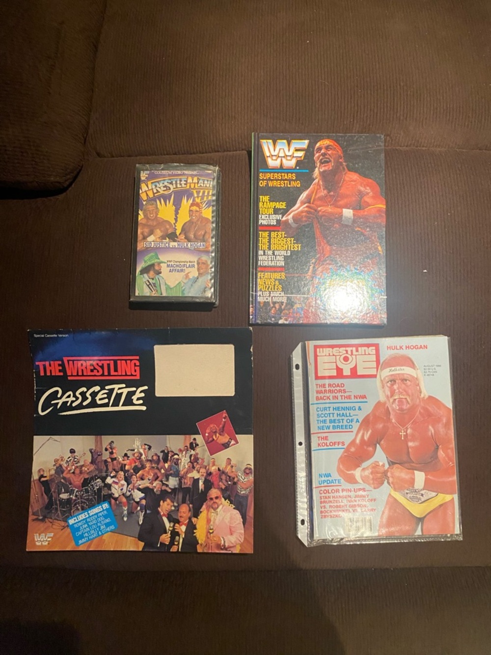 Vintage Hulk Hogan Lot with books and a vhs tape.
